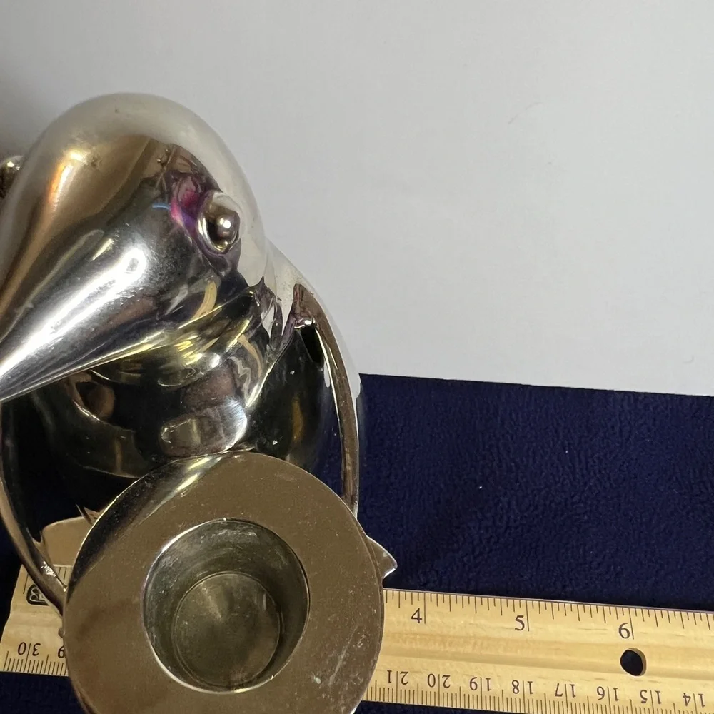 Vintage Restoration Hardware Penguin Candlestick With A Polished Silver Finish